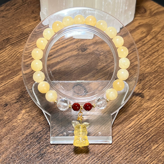 Pokemon Pikachu orange calcite cinnabar faceted clear quartz crystal bead bracelet Shuga Company gift idea